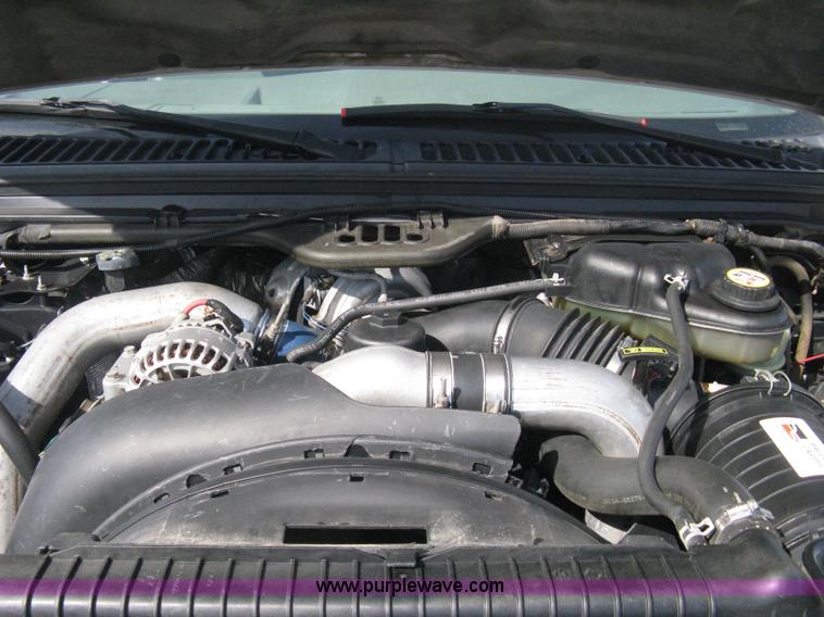 image for item B8133 2003 Ford F350 XL Super Duty flatbed pickup truck