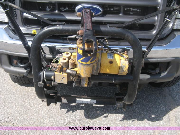 image for item B8133 2003 Ford F350 XL Super Duty flatbed pickup truck