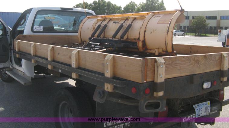 image for item B8133 2003 Ford F350 XL Super Duty flatbed pickup truck