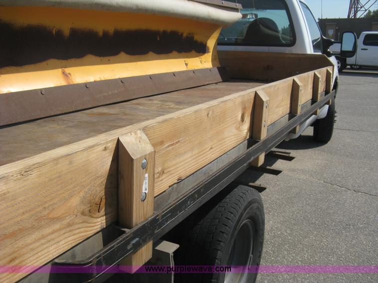 image for item B8133 2003 Ford F350 XL Super Duty flatbed pickup truck