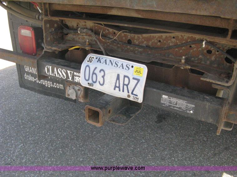 image for item B8133 2003 Ford F350 XL Super Duty flatbed pickup truck