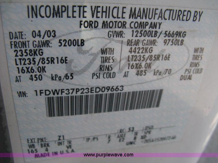 image for item B8133 2003 Ford F350 XL Super Duty flatbed pickup truck