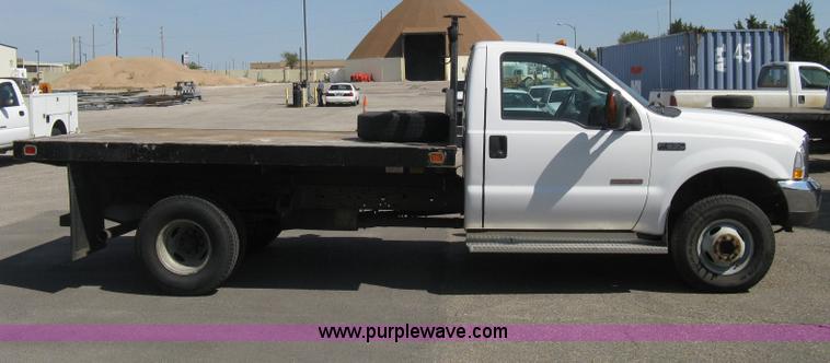 image for item B8134 2004 Ford F350 XL Super Duty flatbed pickup truck