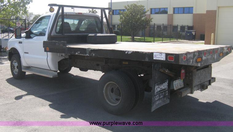 image for item B8134 2004 Ford F350 XL Super Duty flatbed pickup truck