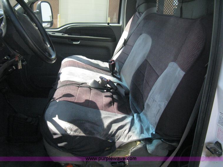 image for item B8134 2004 Ford F350 XL Super Duty flatbed pickup truck