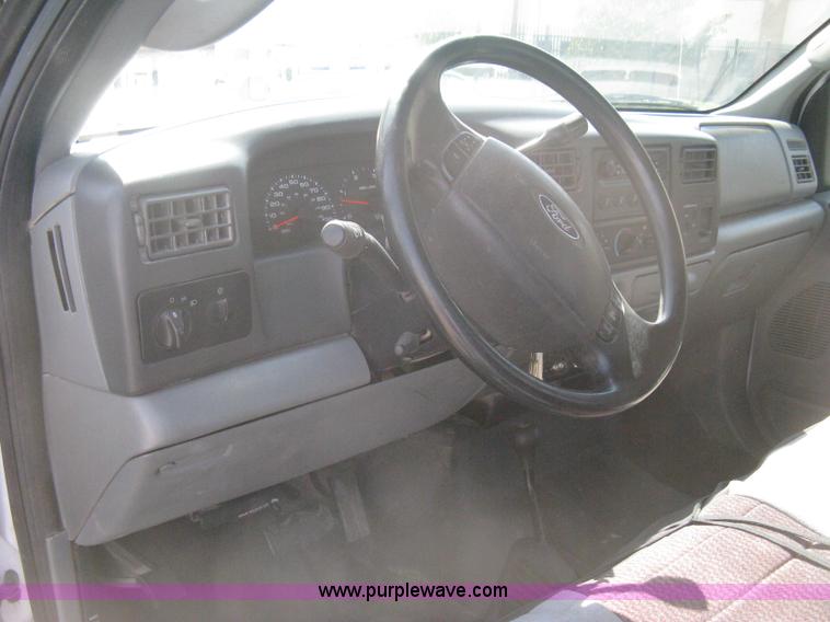 image for item B8134 2004 Ford F350 XL Super Duty flatbed pickup truck