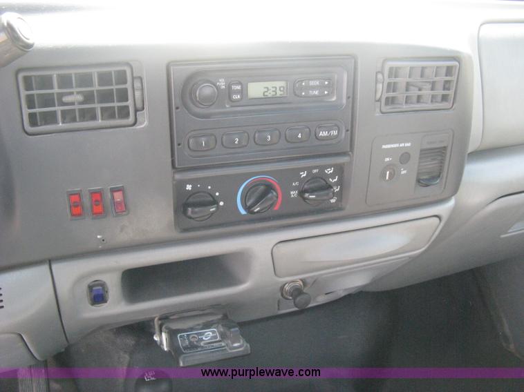 image for item B8134 2004 Ford F350 XL Super Duty flatbed pickup truck