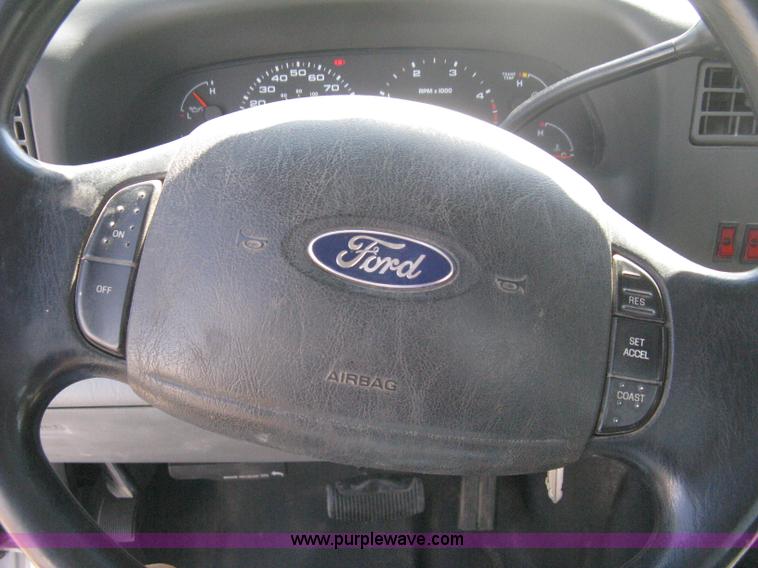 image for item B8134 2004 Ford F350 XL Super Duty flatbed pickup truck