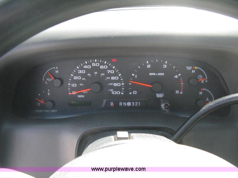 image for item B8134 2004 Ford F350 XL Super Duty flatbed pickup truck