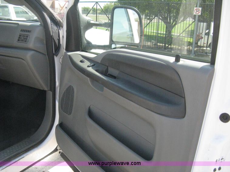 image for item B8134 2004 Ford F350 XL Super Duty flatbed pickup truck