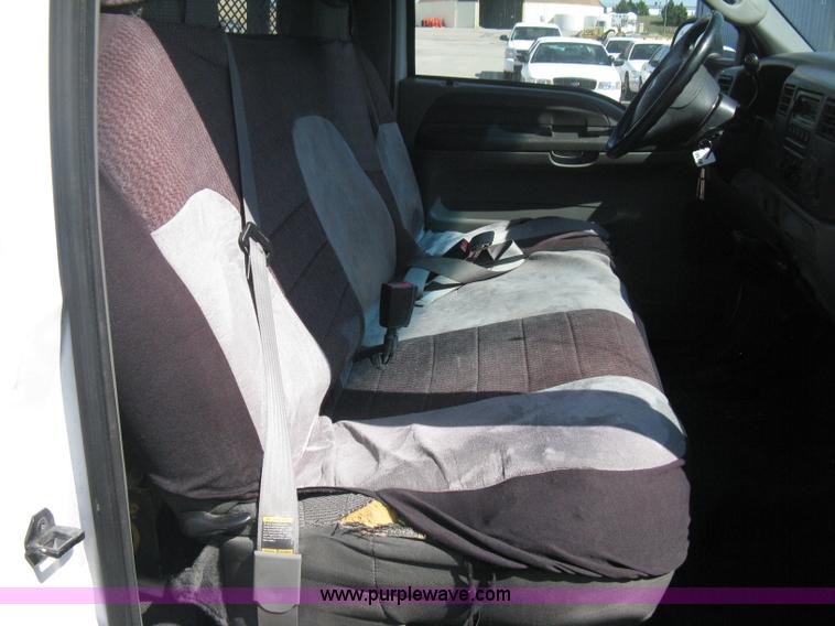 image for item B8134 2004 Ford F350 XL Super Duty flatbed pickup truck