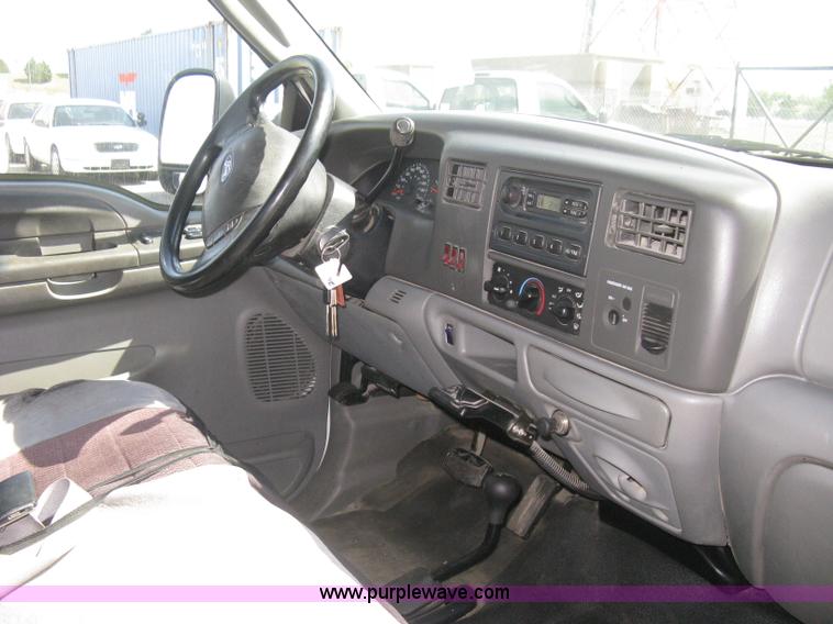 image for item B8134 2004 Ford F350 XL Super Duty flatbed pickup truck