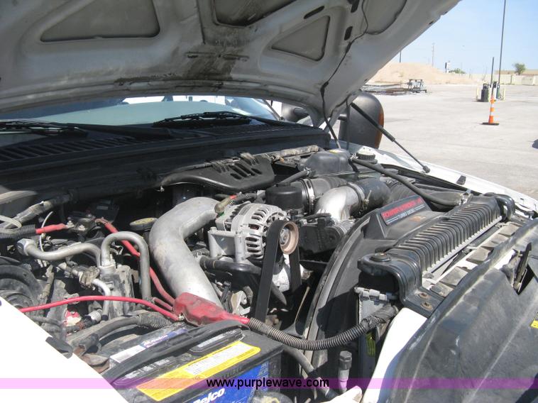 image for item B8134 2004 Ford F350 XL Super Duty flatbed pickup truck