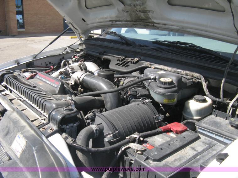 image for item B8134 2004 Ford F350 XL Super Duty flatbed pickup truck