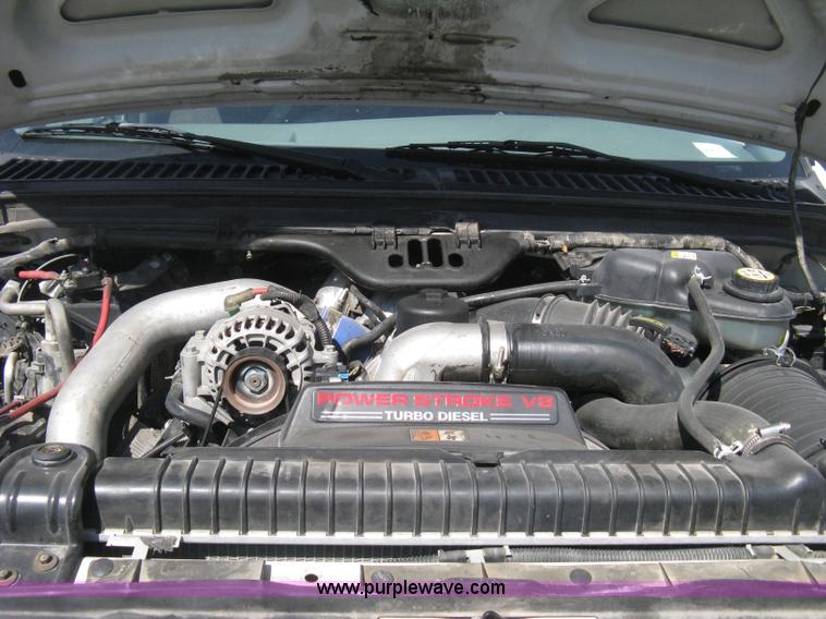 image for item B8134 2004 Ford F350 XL Super Duty flatbed pickup truck