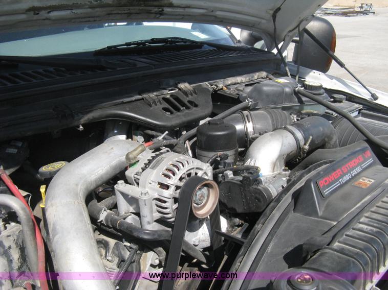 image for item B8134 2004 Ford F350 XL Super Duty flatbed pickup truck