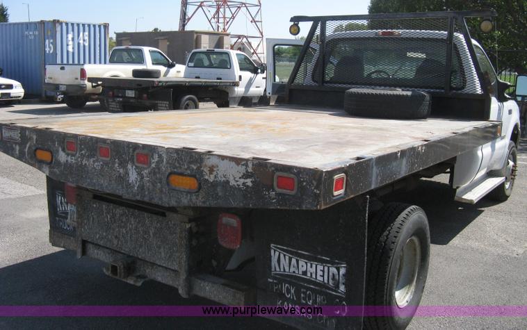 image for item B8134 2004 Ford F350 XL Super Duty flatbed pickup truck
