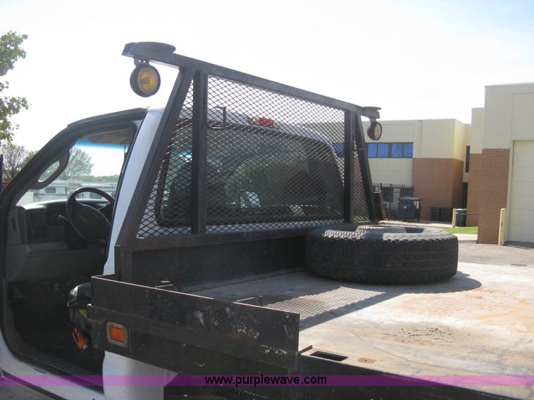 image for item B8134 2004 Ford F350 XL Super Duty flatbed pickup truck