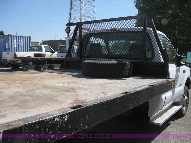 image for item B8134 2004 Ford F350 XL Super Duty flatbed pickup truck