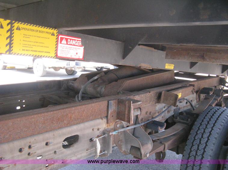 image for item B8134 2004 Ford F350 XL Super Duty flatbed pickup truck