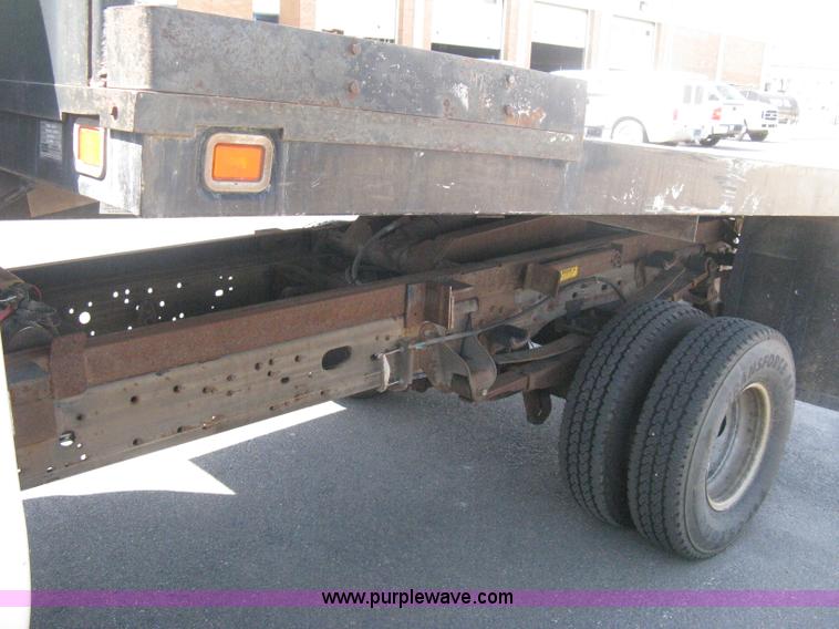 image for item B8134 2004 Ford F350 XL Super Duty flatbed pickup truck