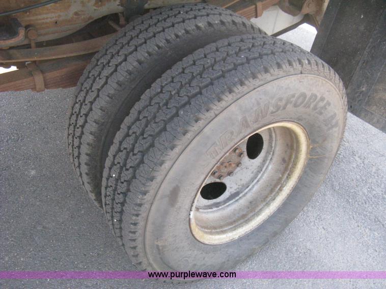 image for item B8134 2004 Ford F350 XL Super Duty flatbed pickup truck