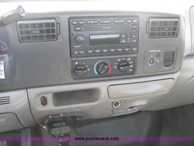 image for item B8141 2003 Ford F350 XL Super Duty flatbed pickup truck