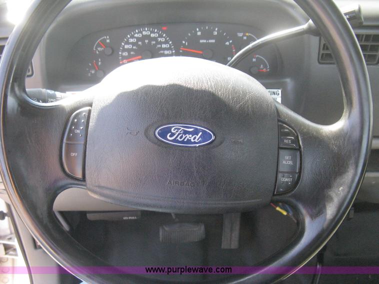 image for item B8141 2003 Ford F350 XL Super Duty flatbed pickup truck