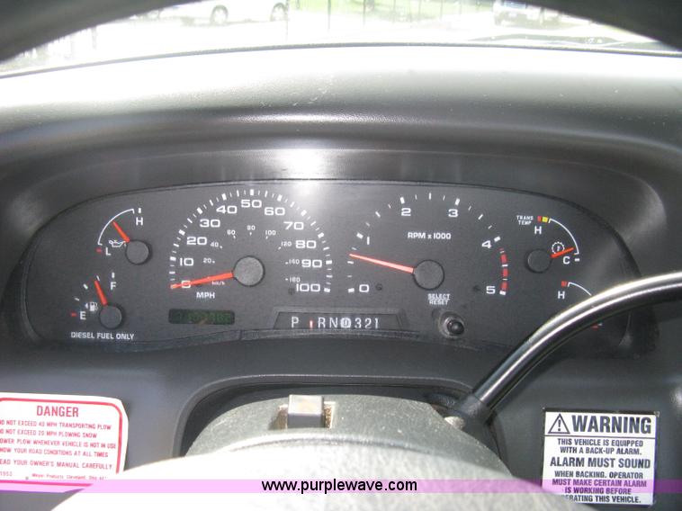 image for item B8141 2003 Ford F350 XL Super Duty flatbed pickup truck