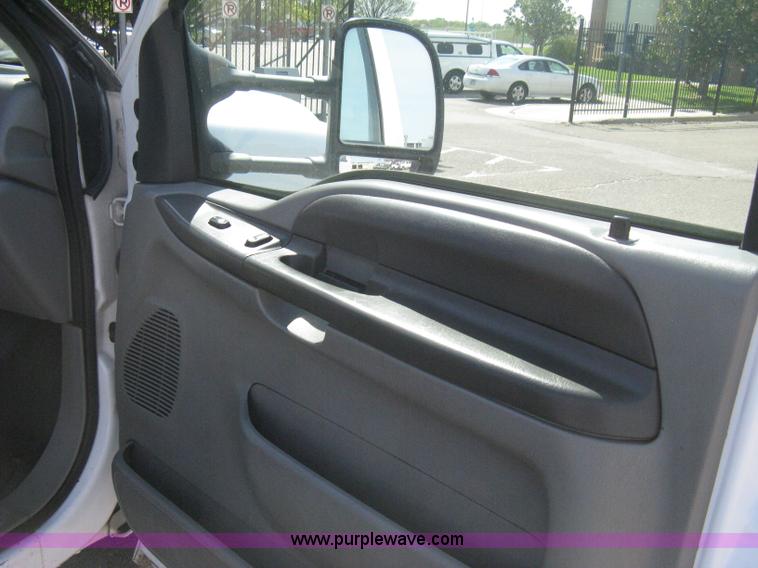 image for item B8141 2003 Ford F350 XL Super Duty flatbed pickup truck