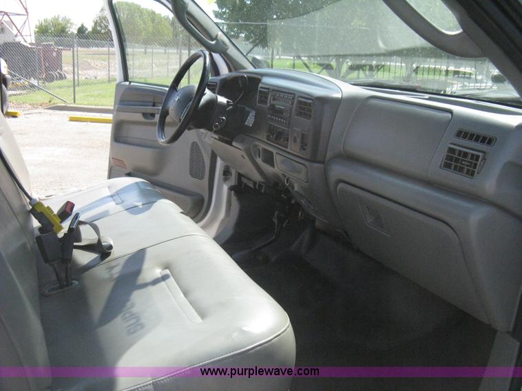 image for item B8141 2003 Ford F350 XL Super Duty flatbed pickup truck