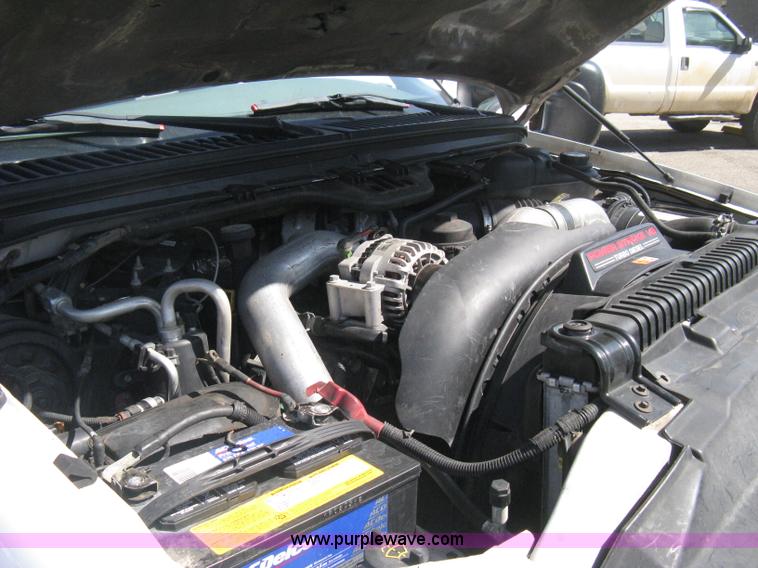 image for item B8141 2003 Ford F350 XL Super Duty flatbed pickup truck