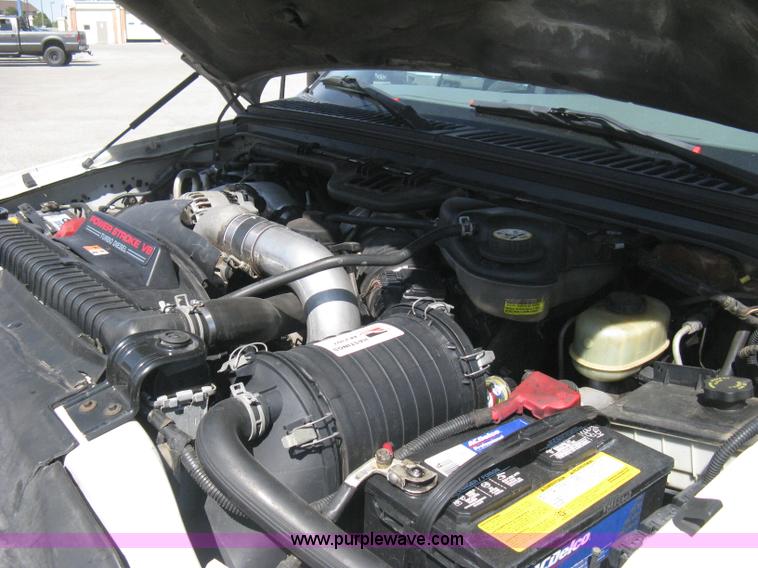 image for item B8141 2003 Ford F350 XL Super Duty flatbed pickup truck