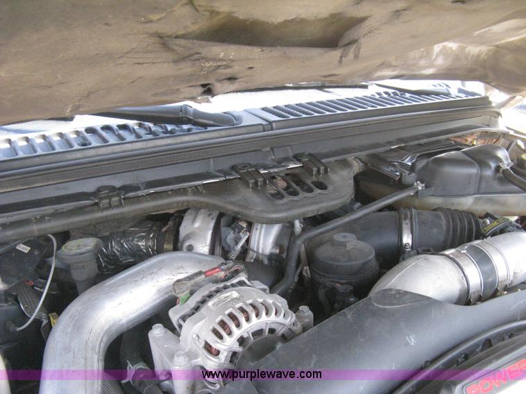 image for item B8141 2003 Ford F350 XL Super Duty flatbed pickup truck