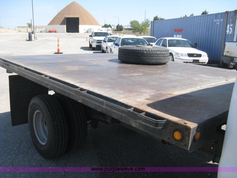image for item B8141 2003 Ford F350 XL Super Duty flatbed pickup truck