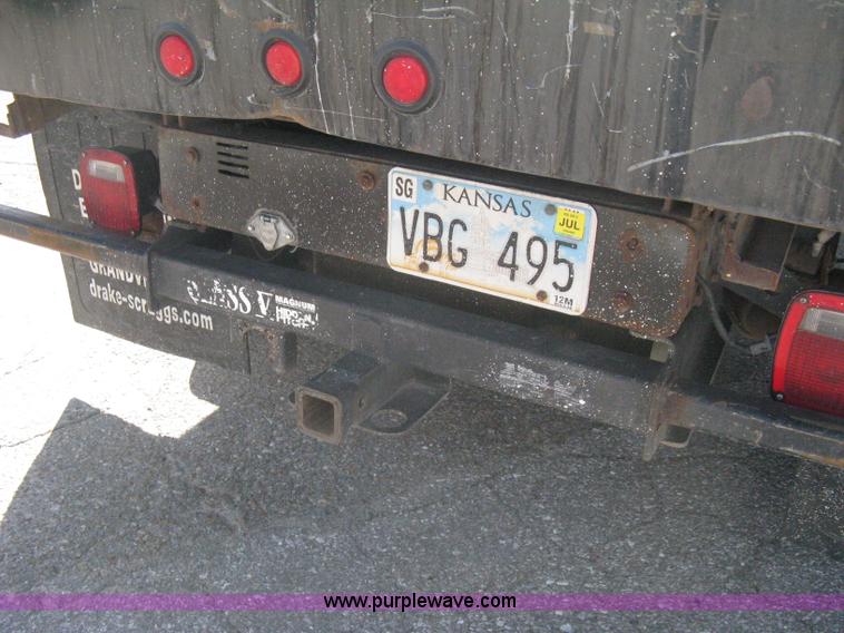 image for item B8141 2003 Ford F350 XL Super Duty flatbed pickup truck