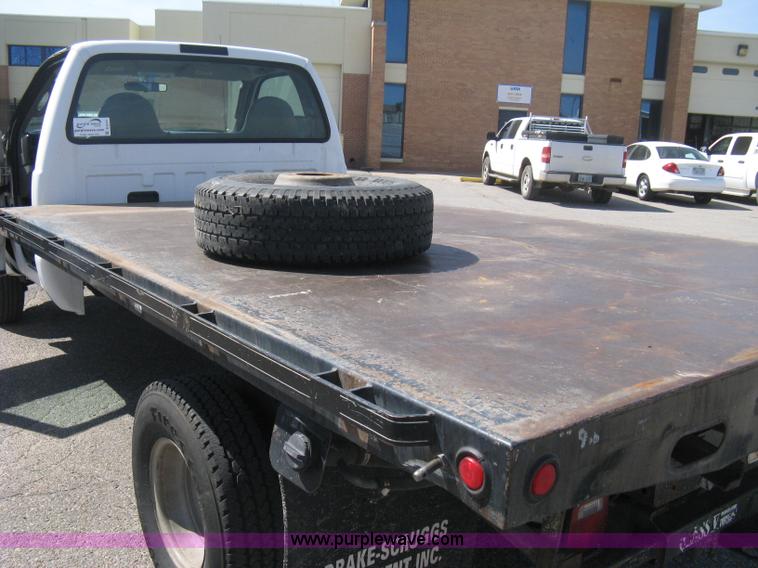 image for item B8141 2003 Ford F350 XL Super Duty flatbed pickup truck