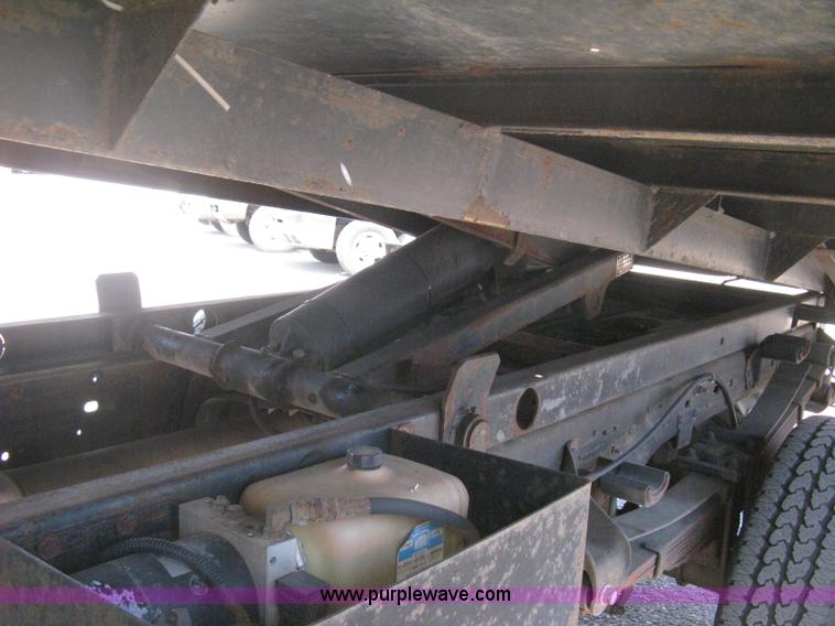 image for item B8141 2003 Ford F350 XL Super Duty flatbed pickup truck