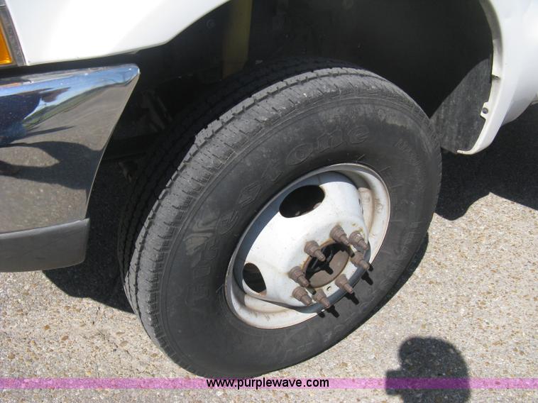 image for item B8141 2003 Ford F350 XL Super Duty flatbed pickup truck