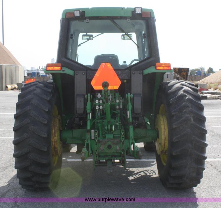 image for item F2620 John Deere 6310 MFWD tractor