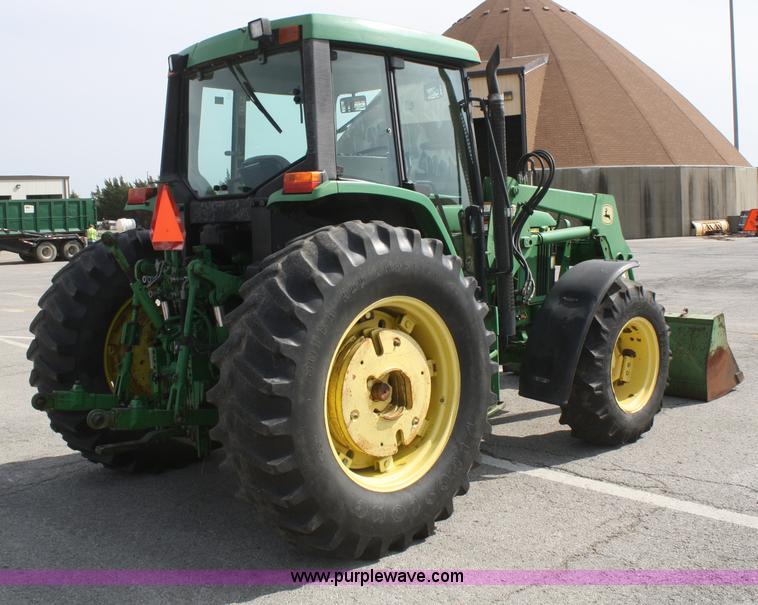 image for item F2620 John Deere 6310 MFWD tractor