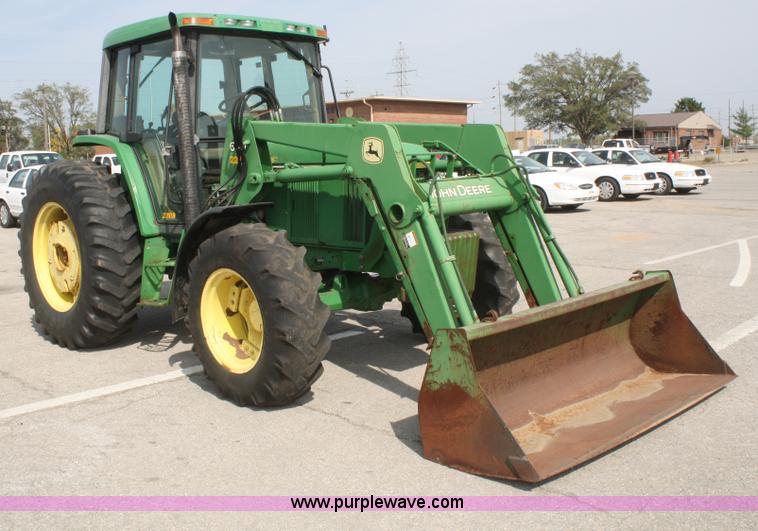 image for item F2620 John Deere 6310 MFWD tractor
