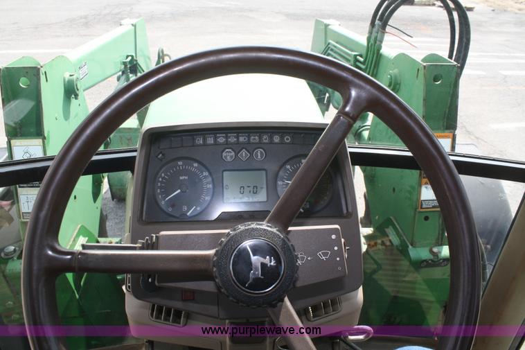 image for item F2620 John Deere 6310 MFWD tractor