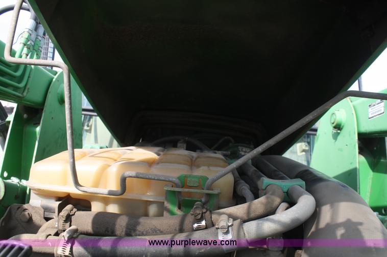 image for item F2620 John Deere 6310 MFWD tractor