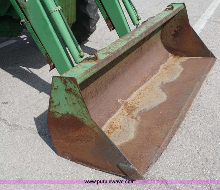 image for item F2620 John Deere 6310 MFWD tractor