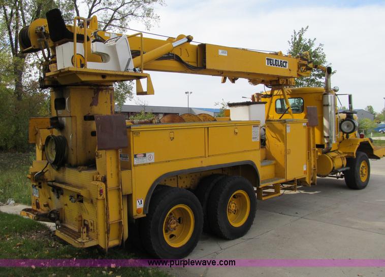 image for item A8475 1985 Volvo / Autocar DC digger derrick truck