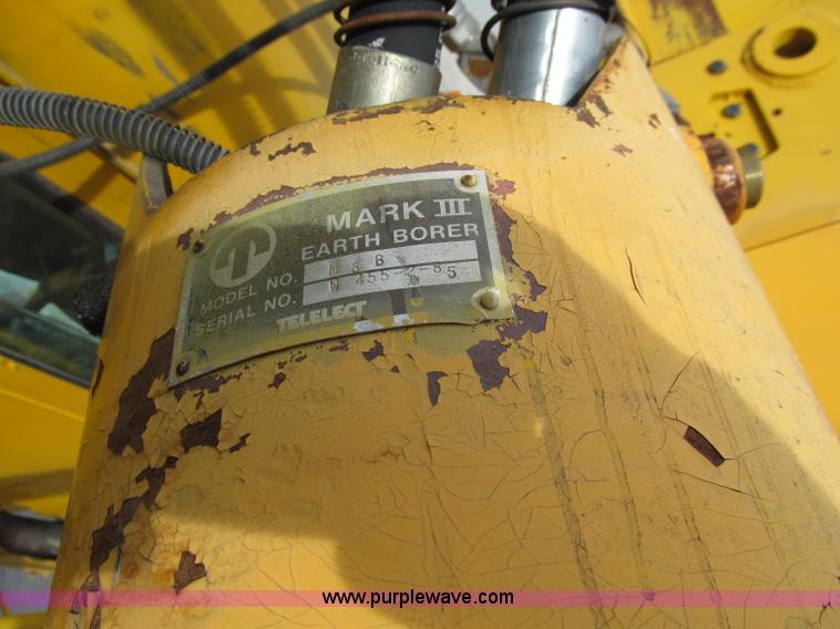 image for item A8475 1985 Volvo / Autocar DC digger derrick truck