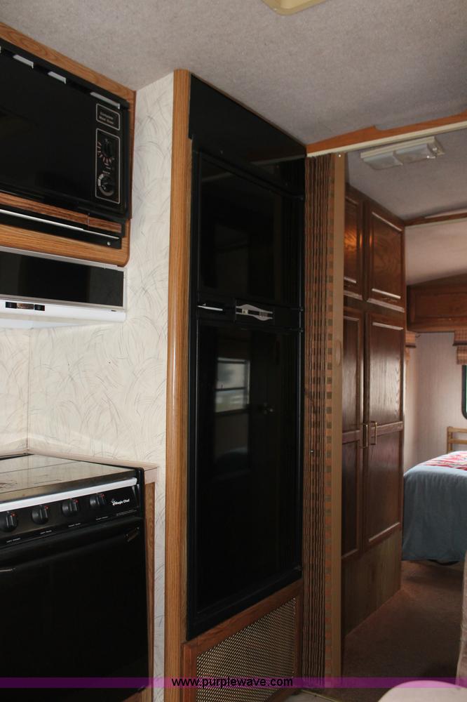 image for item C2824 1991 Fleetwood Bounder 31' RV camper