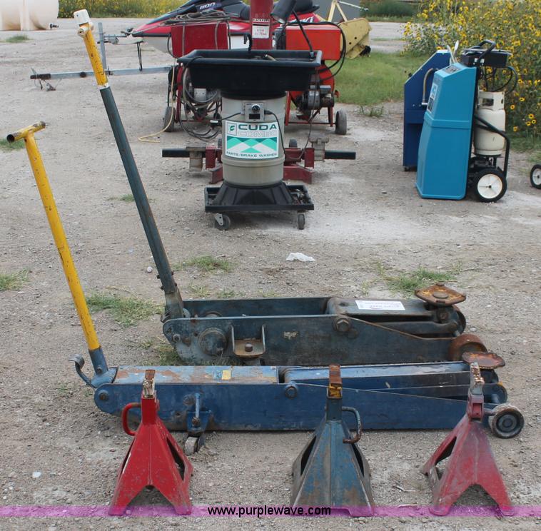 image for item C2832 Two floor jacks and three jack stands