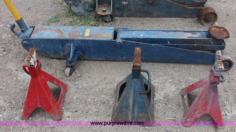 image for item C2832 Two floor jacks and three jack stands